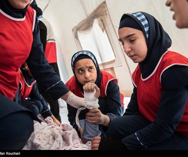 Photo: Iranian school girls training for earthquake