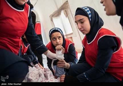 Photo: Iranian school girls training for earthquake